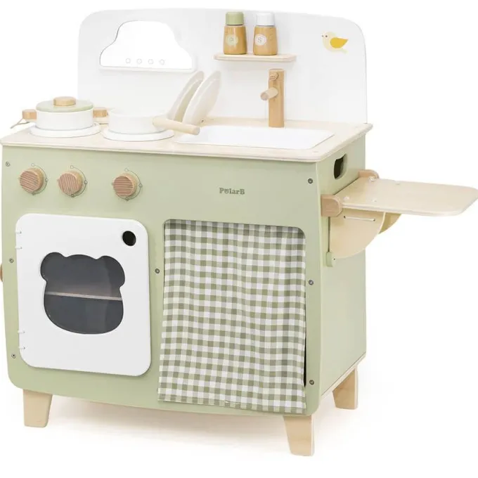 Cucina in legno con tavolino colori pastello